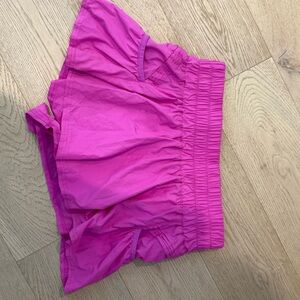 Pink Athletic Shorts with Elastic Waistband and Flowy Design